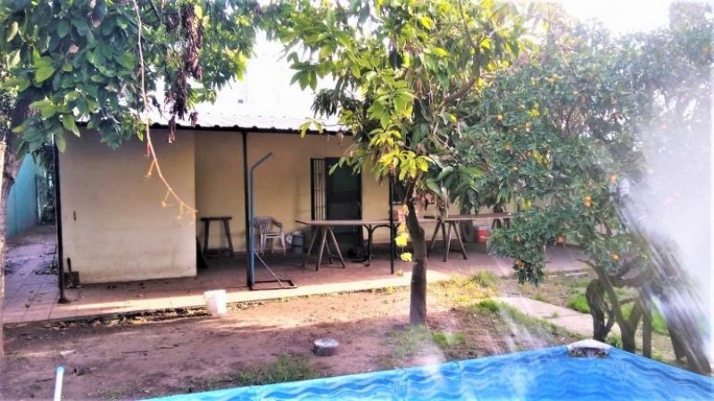 OPORTUNIDAD!!! CHALET DE 5 AMB. CON COCHERA/ FONDO LIBRE.